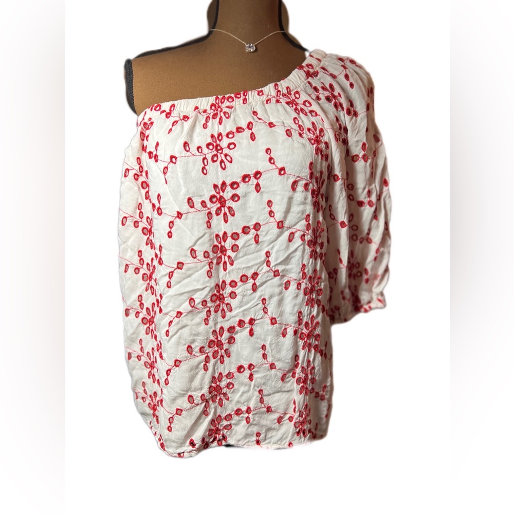 Beautiful one sleeved eyelet detailed top